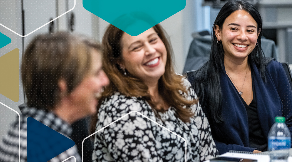 People discussing at conference